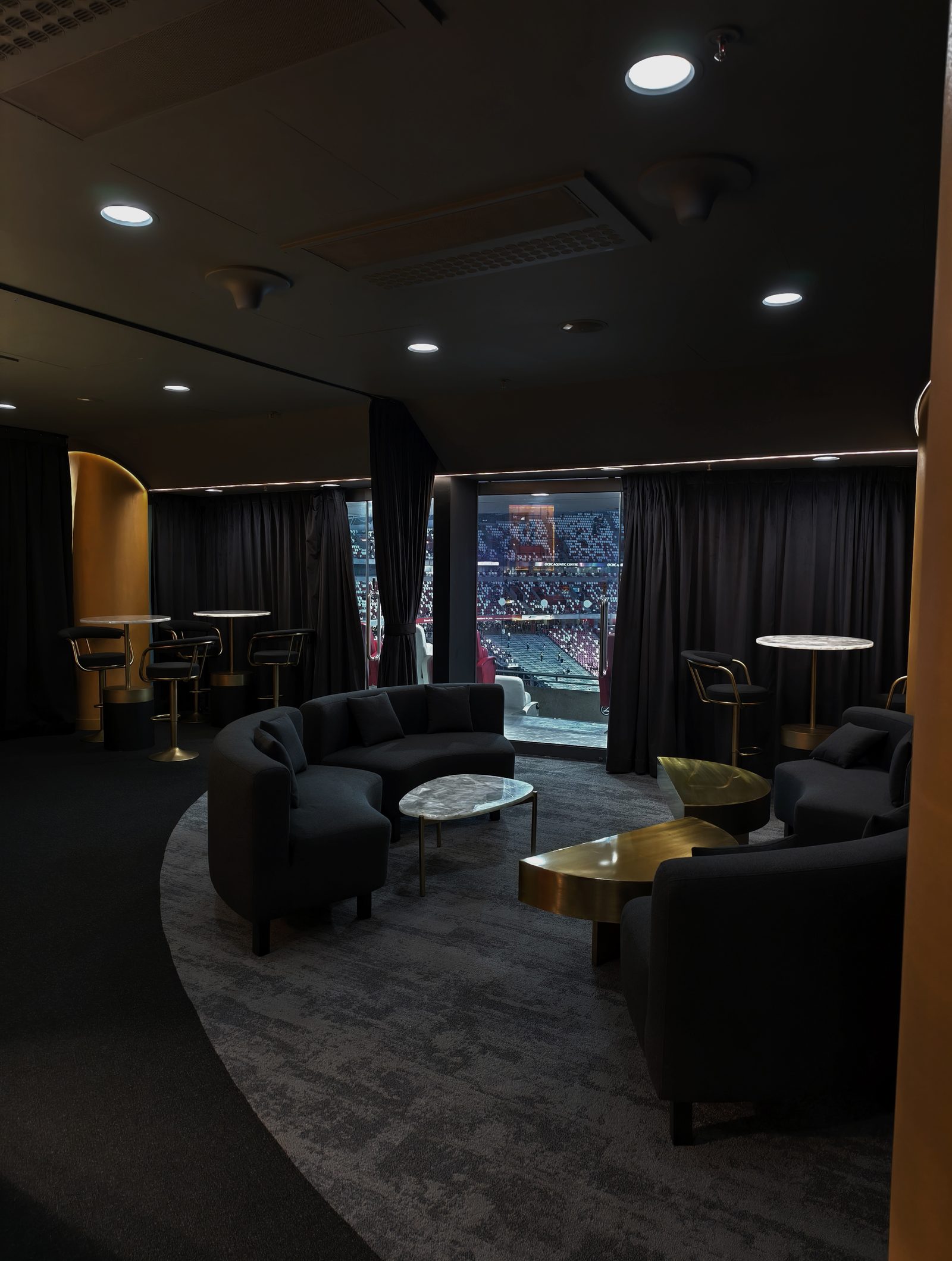 Suite lounge seating with panoramic stadium view